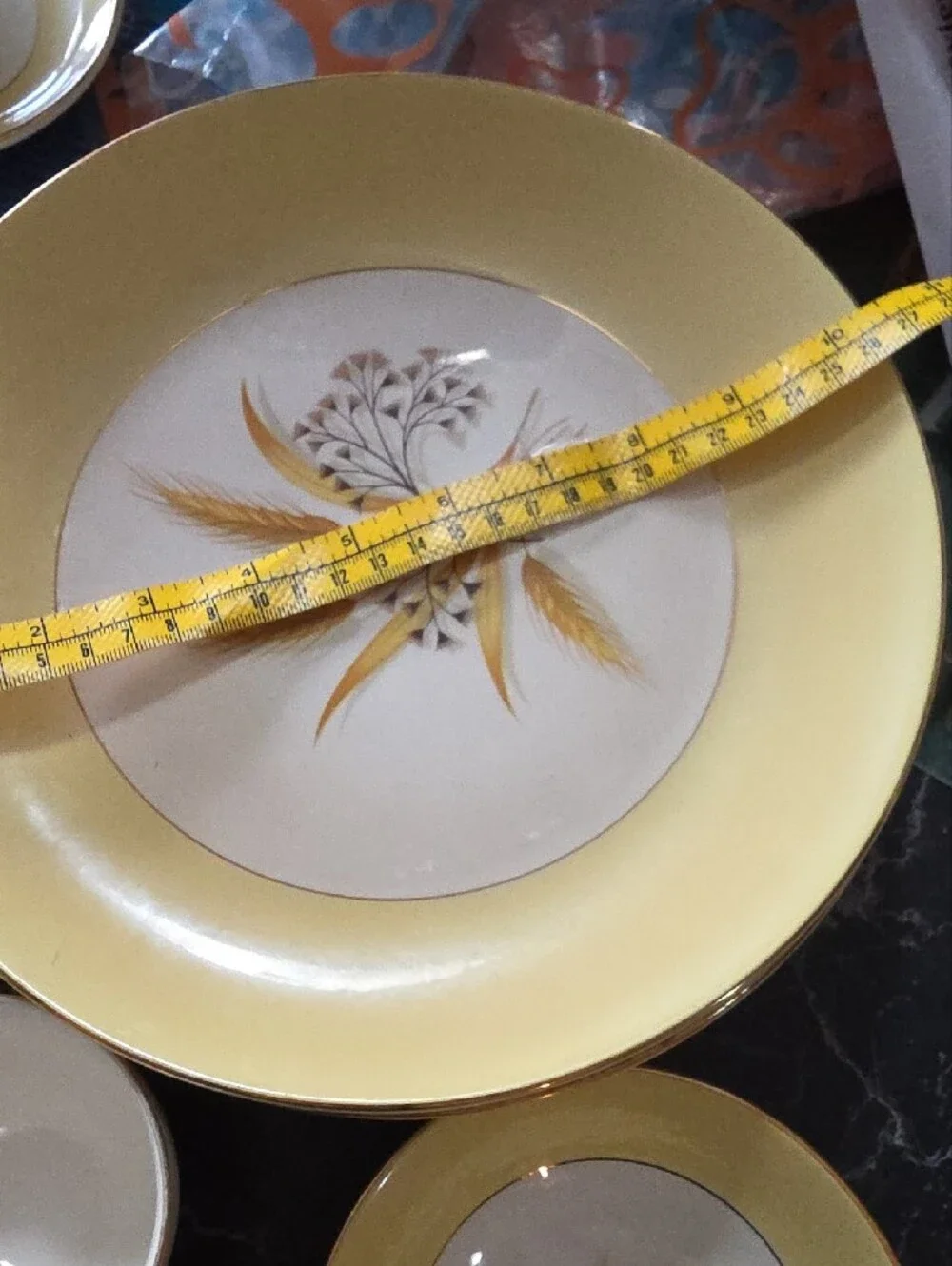 Yellow and White Floral Dinnerware with Gold Trim Accents